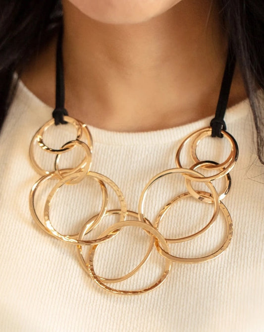 Spiraling out of COUTURE (gold)